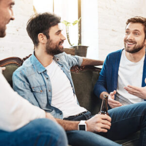 Nice joyful men chatting with each other
